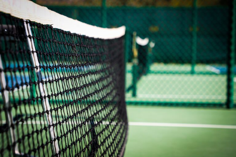 A tennis racket on a tennis court