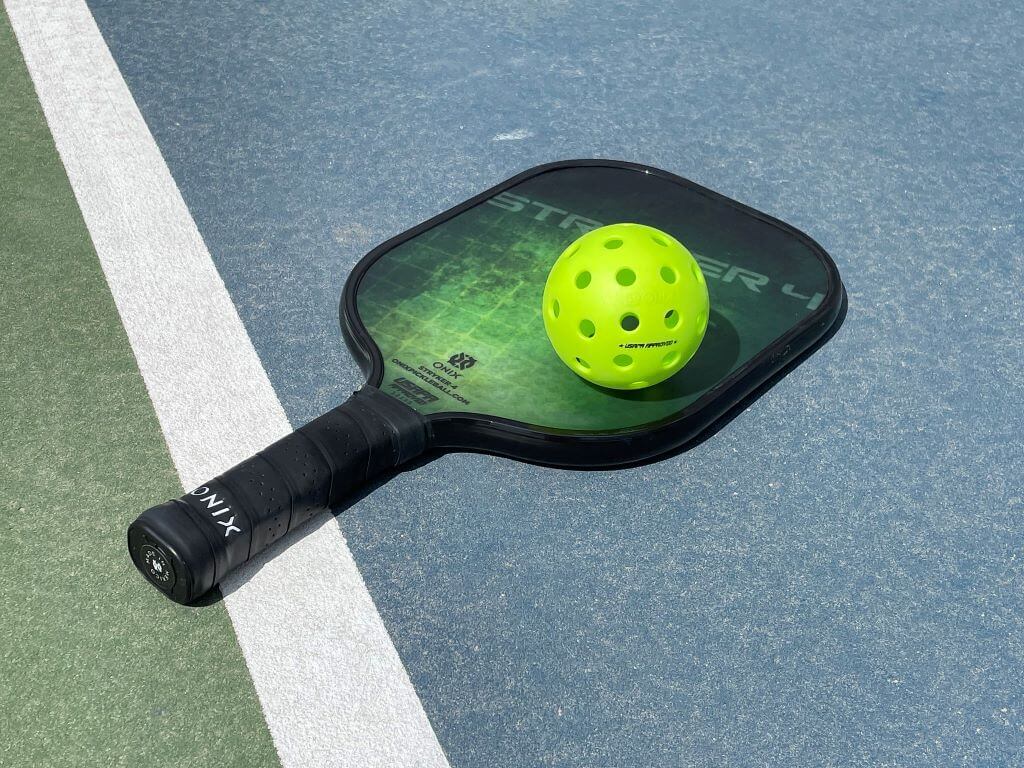 rotating pickleball paddle