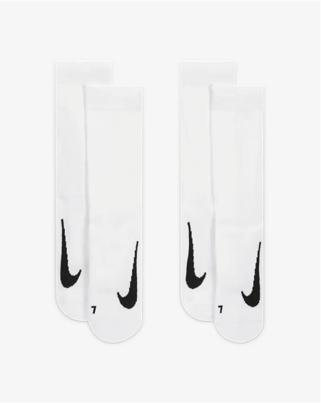 Side-by-side white NikeCourt athletic socks with black nike logo.