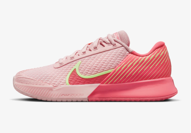 Pink and yellow women's pickleball shoes for hard court surfaces.